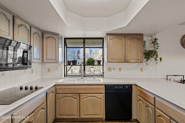 969 S Saguaro Dr, Wickenburg, AZ 85390 - kitchen with a sink, black appliances, tasteful backsplash, and light countertops