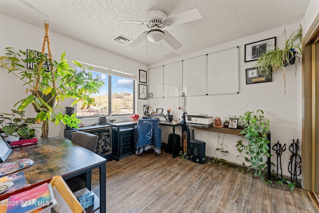 969 S Saguaro Dr, Wickenburg, AZ 85390 - office area featuring light wood finished floors, ceiling fan, and a textured ceiling