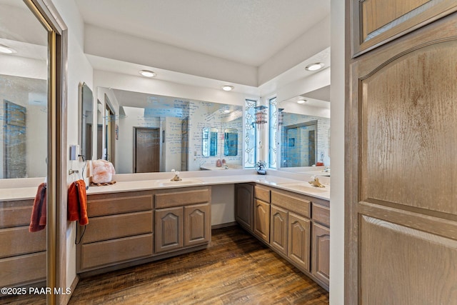 969 S Saguaro Dr, Wickenburg, AZ 85390 - bathroom with double vanity, wood finished floors, and recessed lighting