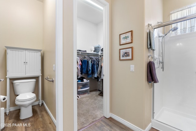 6237 E Boothwyn St, Prescott Valley, AZ 86314 - full bathroom with a shower stall, wood finished floors, and a spacious closet