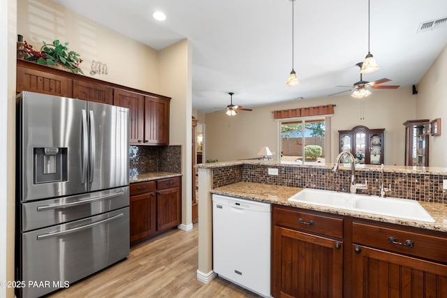 6237 E Boothwyn St, Prescott Valley, AZ 86314 - kitchen featuring stainless steel fridge, dishwasher, a ceiling fan, and tasteful backsplash