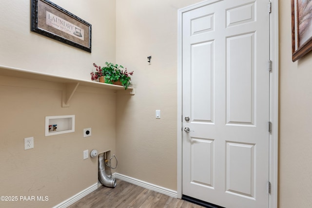 6237 E Boothwyn St, Prescott Valley, AZ 86314 - washroom featuring hookup for an electric dryer, light wood-style floors, washer hookup, and hookup for a gas dryer