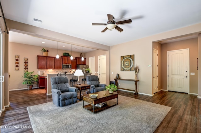 12993 E Toro St, Dewey-Humboldt, AZ 86327 - living room featuring a ceiling fan, dark wood-style floors, and recessed lighting