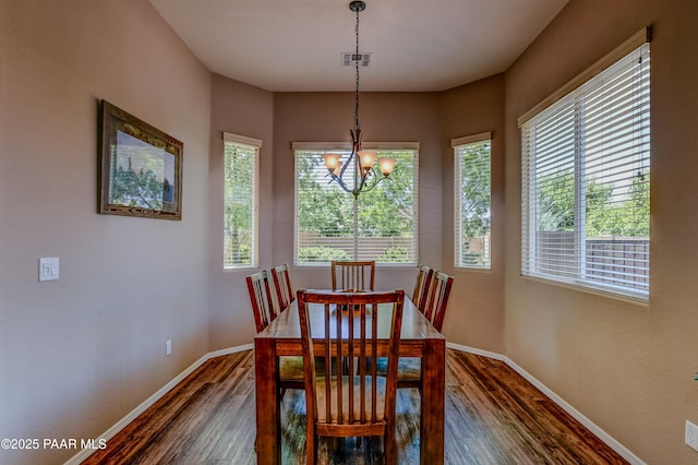 12993 E Toro St, Dewey-Humboldt, AZ 86327 - dining room with a chandelier, healthy amount of natural light, and dark wood-style floors
