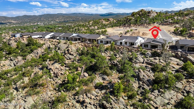 aerial view featuring a mountain view and a residential view