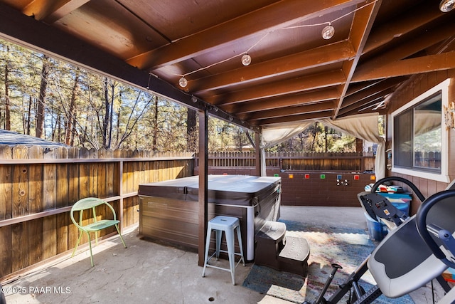 view of patio with a hot tub