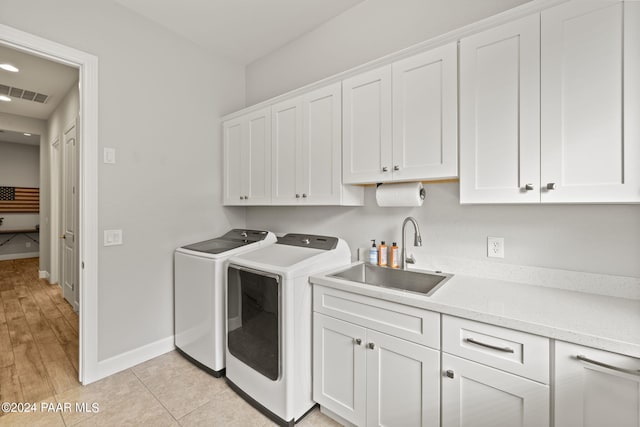 5109 Porter Creek Dr, Prescott, AZ 86301 - laundry area featuring washer and clothes dryer, cabinet space, baseboards, and recessed lighting