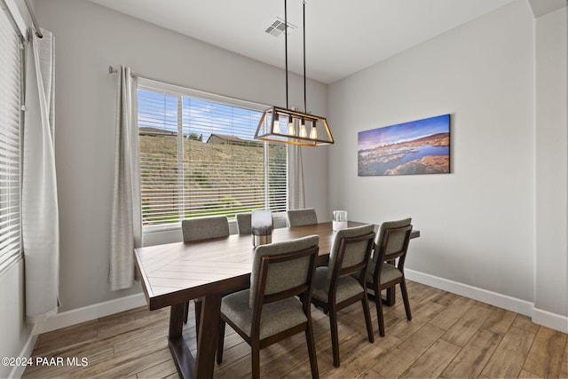 5109 Porter Creek Dr, Prescott, AZ 86301 - dining space with light wood-style floors, baseboards, and a chandelier