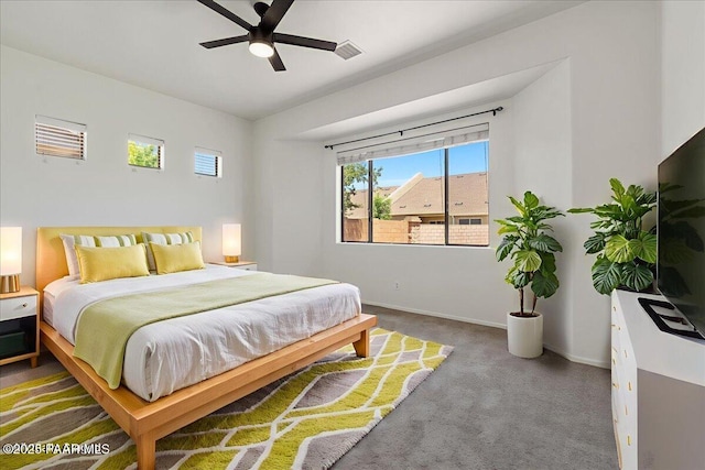 4786 N Edgemont Rd, Prescott Valley, AZ 86314 - carpeted bedroom with baseboards and ceiling fan