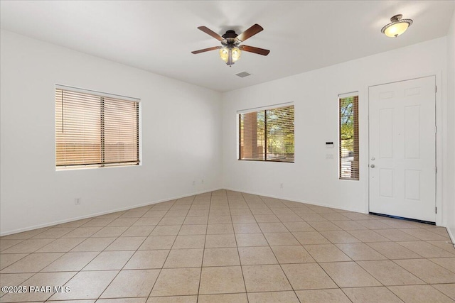 4786 N Edgemont Rd, Prescott Valley, AZ 86314 - unfurnished room featuring a ceiling fan and light tile patterned floors