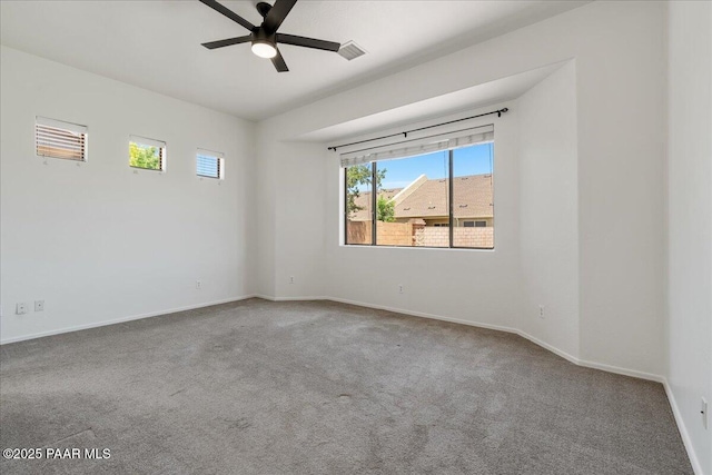 4786 N Edgemont Rd, Prescott Valley, AZ 86314 - carpeted empty room featuring ceiling fan and plenty of natural light