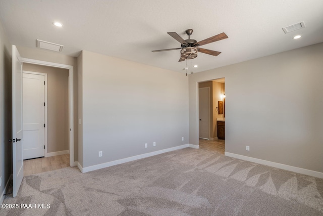 unfurnished room featuring ceiling fan, light carpet, baseboards, and recessed lighting