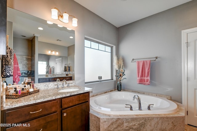 8675 N Buffalo Hill Ct, Prescott Valley, AZ 86315 - full bath featuring plenty of natural light, a bath, visible vents, and vanity