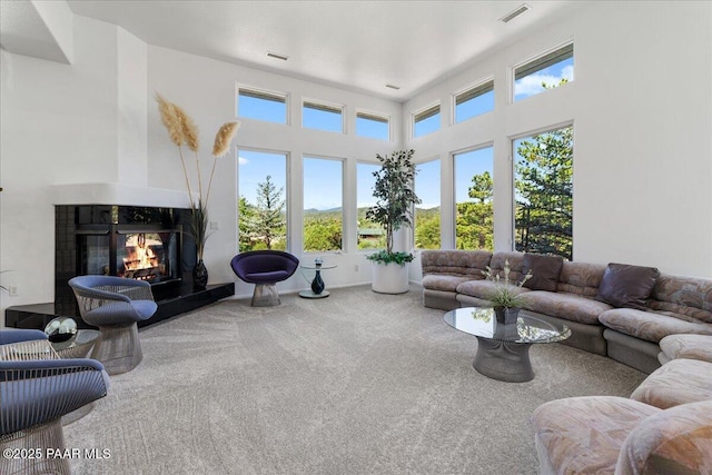 1369 Sierry Peaks Dr, Prescott, AZ 86305 - living area featuring carpet and a multi sided fireplace