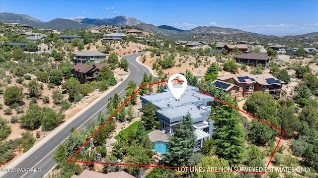 1369 Sierry Peaks Dr, Prescott, AZ 86305 - aerial view of residential area featuring property parcel outlined and a mountainous background