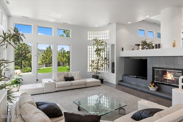 1369 Sierry Peaks Dr, Prescott, AZ 86305 - living room featuring recessed lighting, a fireplace, and a towering ceiling