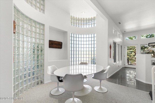 1369 Sierry Peaks Dr, Prescott, AZ 86305 - dining area with tile patterned floors and a high ceiling