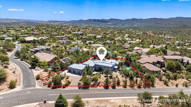 1369 Sierry Peaks Dr, Prescott, AZ 86305 - aerial view of residential area featuring a mountainous background and property parcel outlined