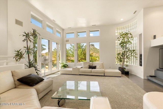 1369 Sierry Peaks Dr, Prescott, AZ 86305 - living room featuring healthy amount of natural light, a high ceiling, and recessed lighting