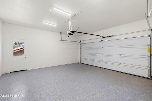 1800 N Pearl Ln, Prescott, AZ 86301 - garage with a garage door opener and baseboards