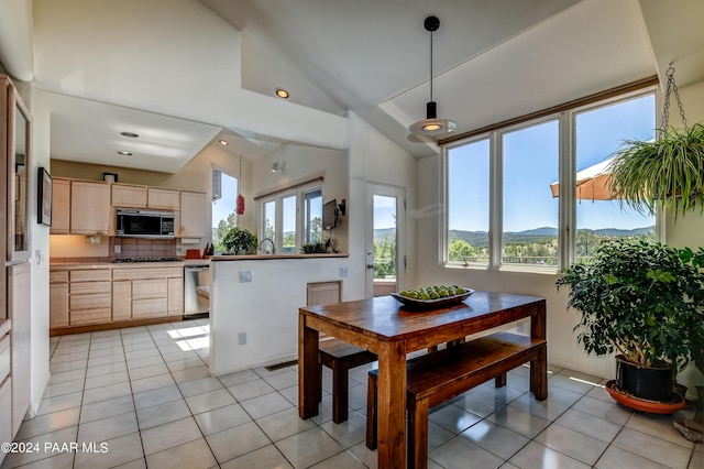 1301 S Manzanita Hill Rd, Prescott, AZ 86303 - dining area featuring recessed lighting, light tile patterned floors, vaulted ceiling, and a mountain view