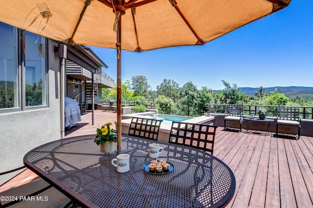 1301 S Manzanita Hill Rd, Prescott, AZ 86303 - wooden terrace featuring an outdoor pool, a mountain view, outdoor dining space, and a grill