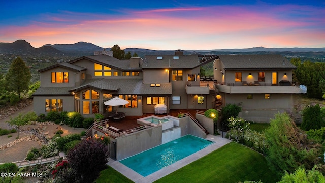 1301 S Manzanita Hill Rd, Prescott, AZ 86303 - rear view of house with a yard, an outdoor pool, a balcony, and a mountain view