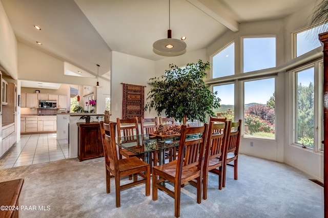 1301 S Manzanita Hill Rd, Prescott, AZ 86303 - dining space featuring high vaulted ceiling, light colored carpet, beam ceiling, and light tile patterned floors