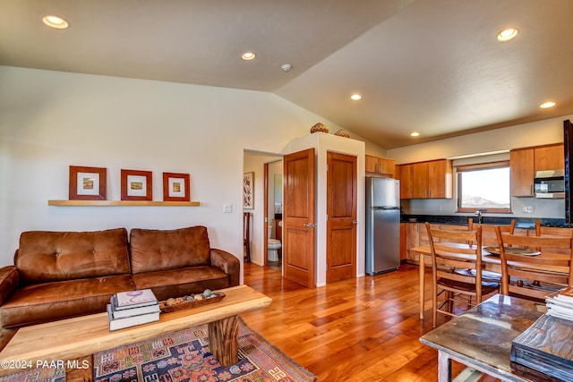 1301 S Manzanita Hill Rd, Prescott, AZ 86303 - living room featuring light wood finished floors, vaulted ceiling, and recessed lighting