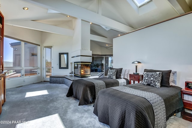 1301 S Manzanita Hill Rd, Prescott, AZ 86303 - carpeted bedroom with a skylight, high vaulted ceiling, and a multi sided fireplace