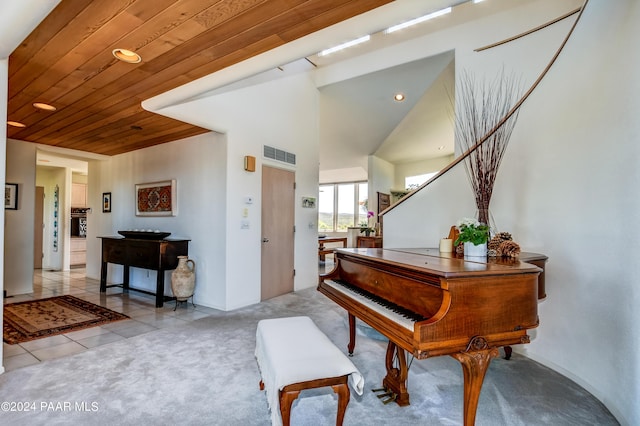 1301 S Manzanita Hill Rd, Prescott, AZ 86303 - sitting room with light tile patterned floors, visible vents, wood ceiling, and light colored carpet