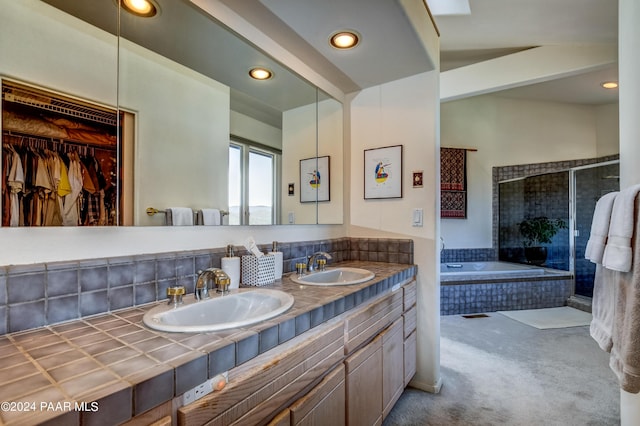 1301 S Manzanita Hill Rd, Prescott, AZ 86303 - full bath featuring a sink, double vanity, tiled shower, and a garden tub
