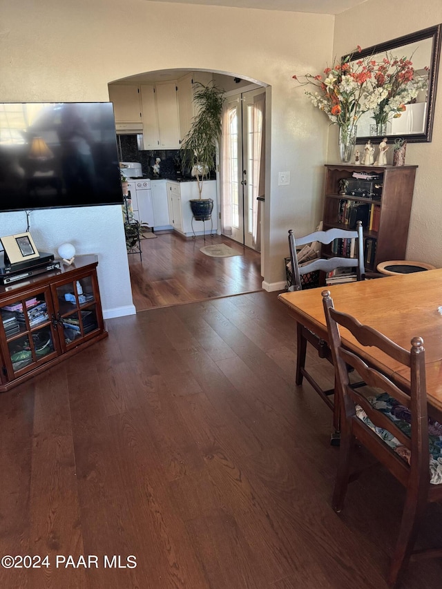 interior space featuring french doors and dark hardwood / wood-style floors