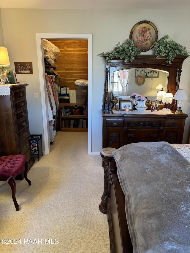 carpeted bedroom with a closet