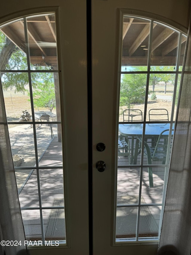 doorway to outside featuring plenty of natural light