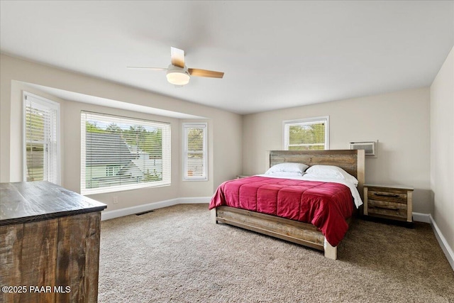 122 N Willow St, Prescott, AZ 86305 - bedroom featuring baseboards, carpet floors, a wall mounted AC, and ceiling fan