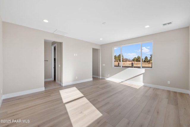 unfurnished living room with light wood-type flooring