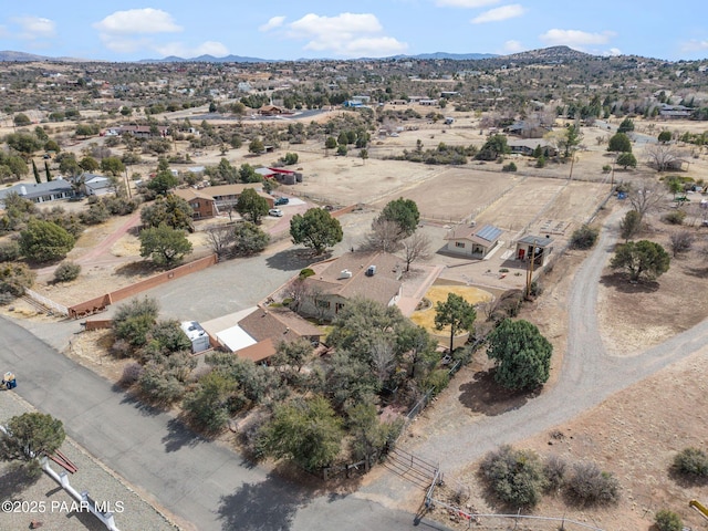 bird's eye view featuring a mountain view and view of desert