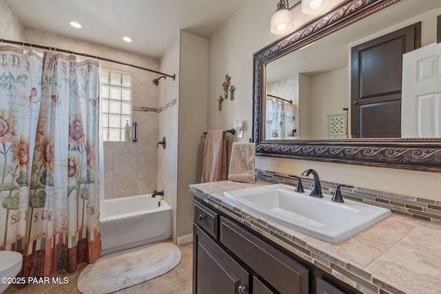 bathroom with vanity, toilet, shower / bathtub combination with curtain, and tasteful backsplash