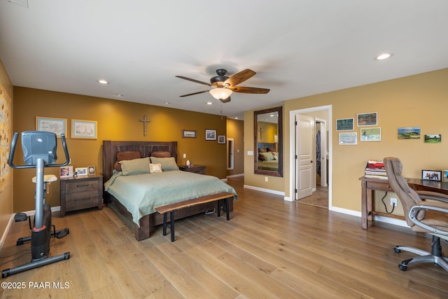 bedroom featuring light wood-style flooring, recessed lighting, and baseboards