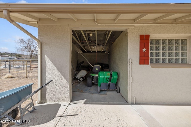 exterior space featuring stucco siding