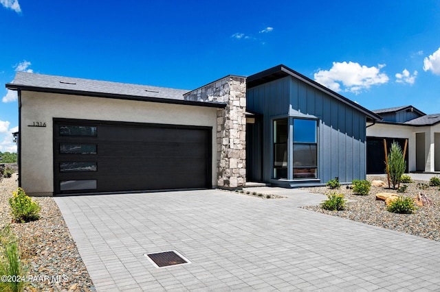 view of front of property with a garage