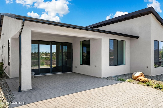 back of house featuring a patio