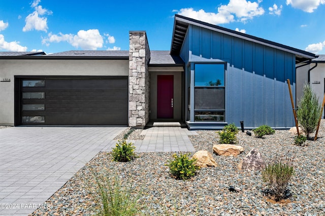 view of front of property featuring a garage