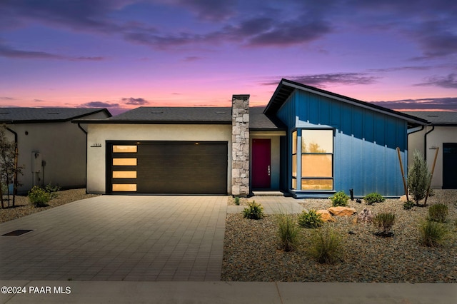 view of front of home with a garage