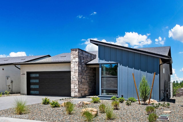 modern home featuring a garage