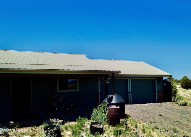 1155 W Half Moon Ct, Ash Fork, AZ 86320 - view of home's exterior with metal roof