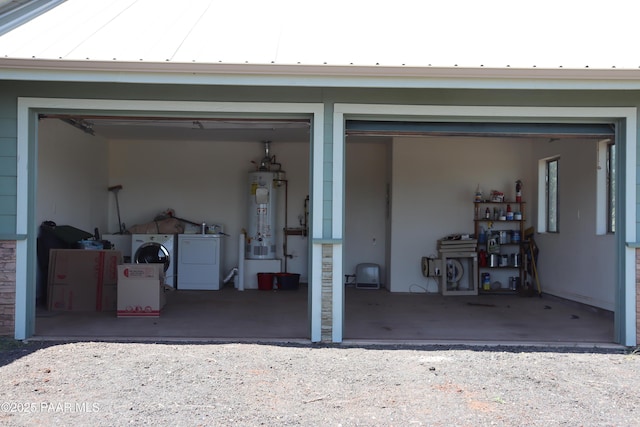 1155 W Half Moon Ct, Ash Fork, AZ 86320 - garage with gas water heater and independent washer and dryer