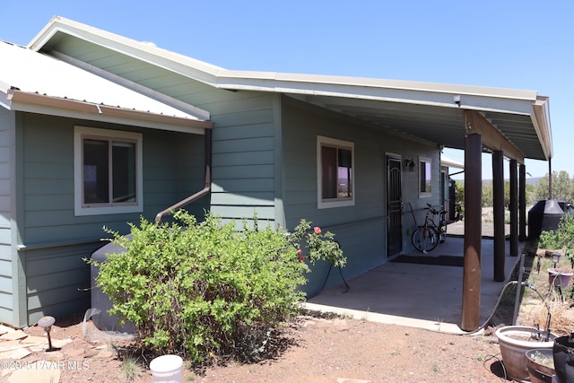 1155 W Half Moon Ct, Ash Fork, AZ 86320 - view of property exterior with a patio