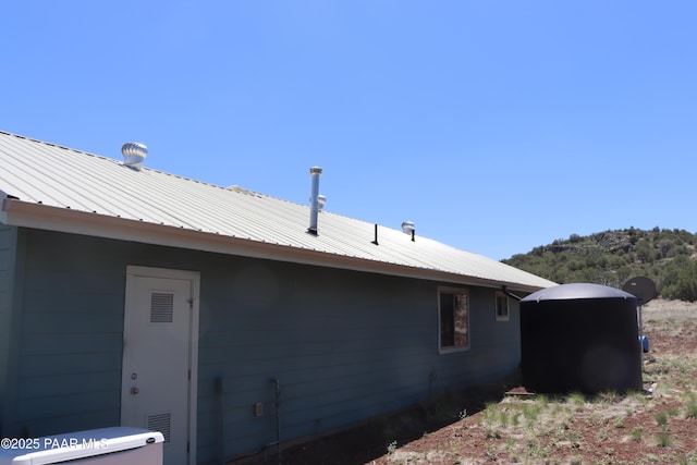 1155 W Half Moon Ct, Ash Fork, AZ 86320 - view of home's exterior featuring metal roof